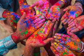 People celebrating Holi with colors